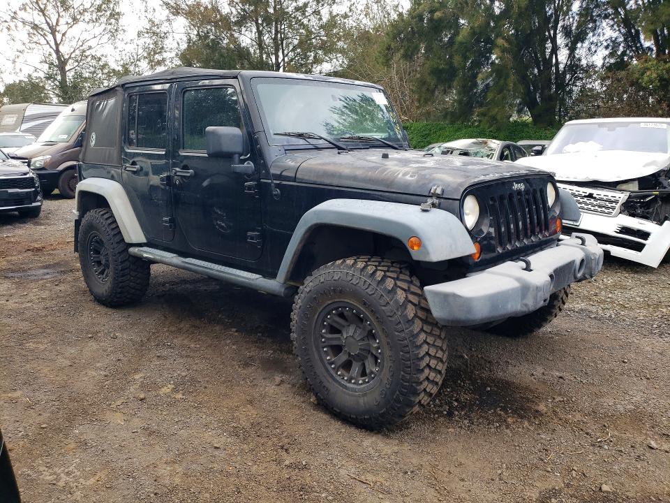 Auction sale of the 2010 Jeep Wrangler Unlimited, vin: 1J4BB3H17AL209585, lot number: 76658135