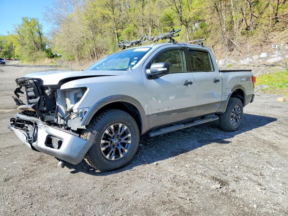 51220976 :رقم المزاد ، 1N6AA1E52KN504371 vin ، 2019 Nissan Titan مزاد بيع