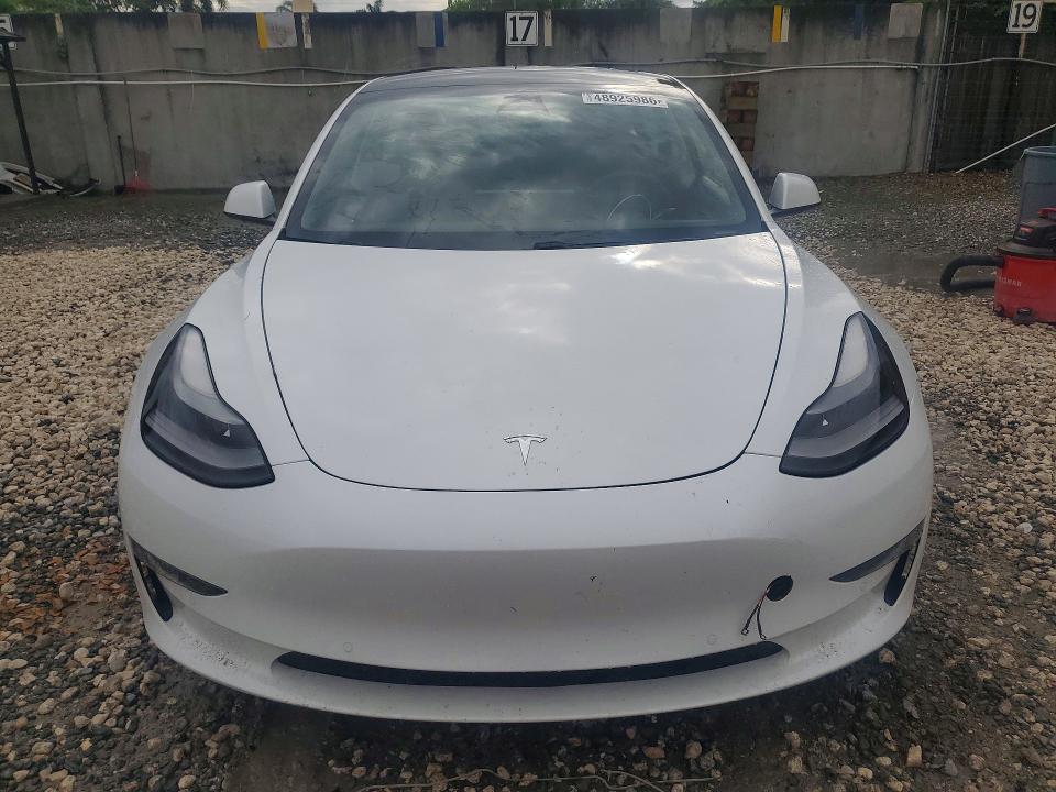 Продажа на аукционе авто 2021 Tesla Model 3, vin: 5YJ3E1EAXMF083532, номер лота: 48925986
