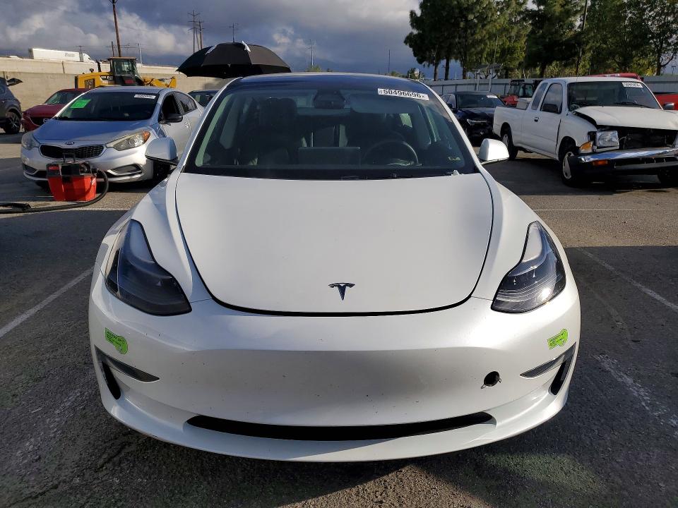Продажа на аукционе авто 2023 Tesla Model 3, vin: 5YJ3E1EA9PF557667, номер лота: 50496696