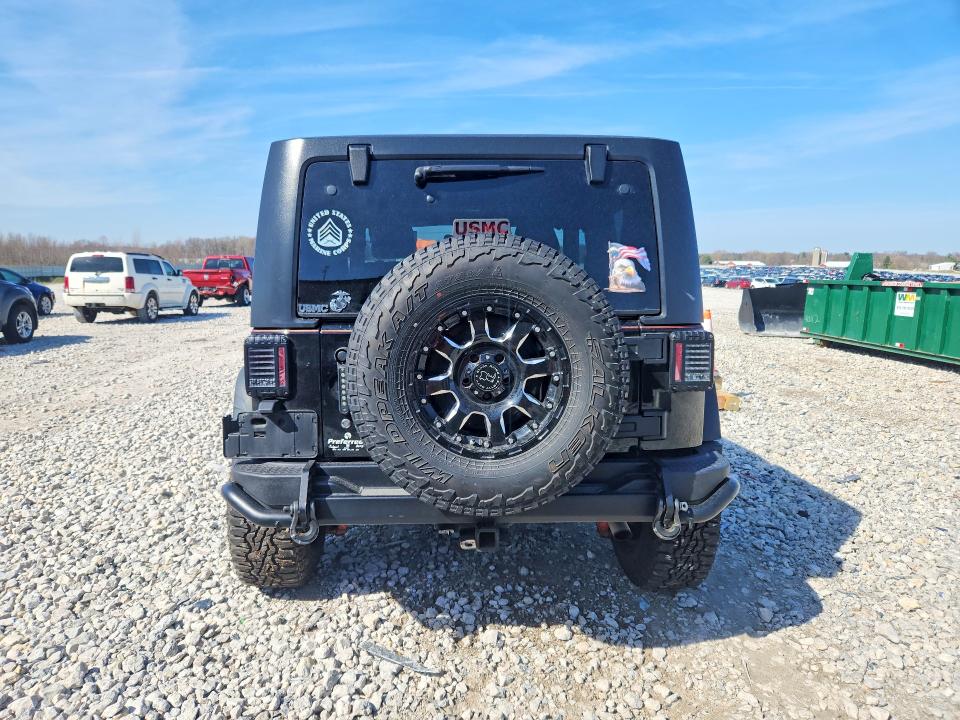 Auction sale of the 2012 Jeep Wrangler, vin: 1C4BJWCG7CL180663, lot number: 49414666