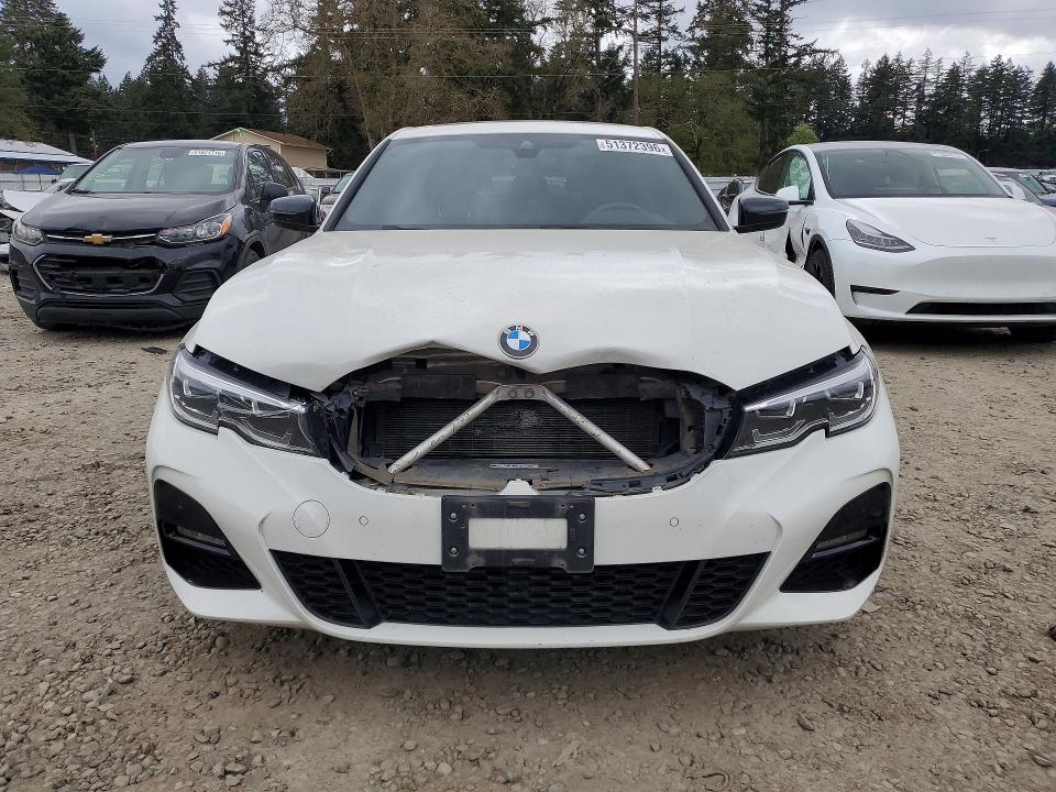 51372396 :رقم المزاد ، 3MW5P9J04M8B82489 vin ، 2021 Bmw 330xe مزاد بيع
