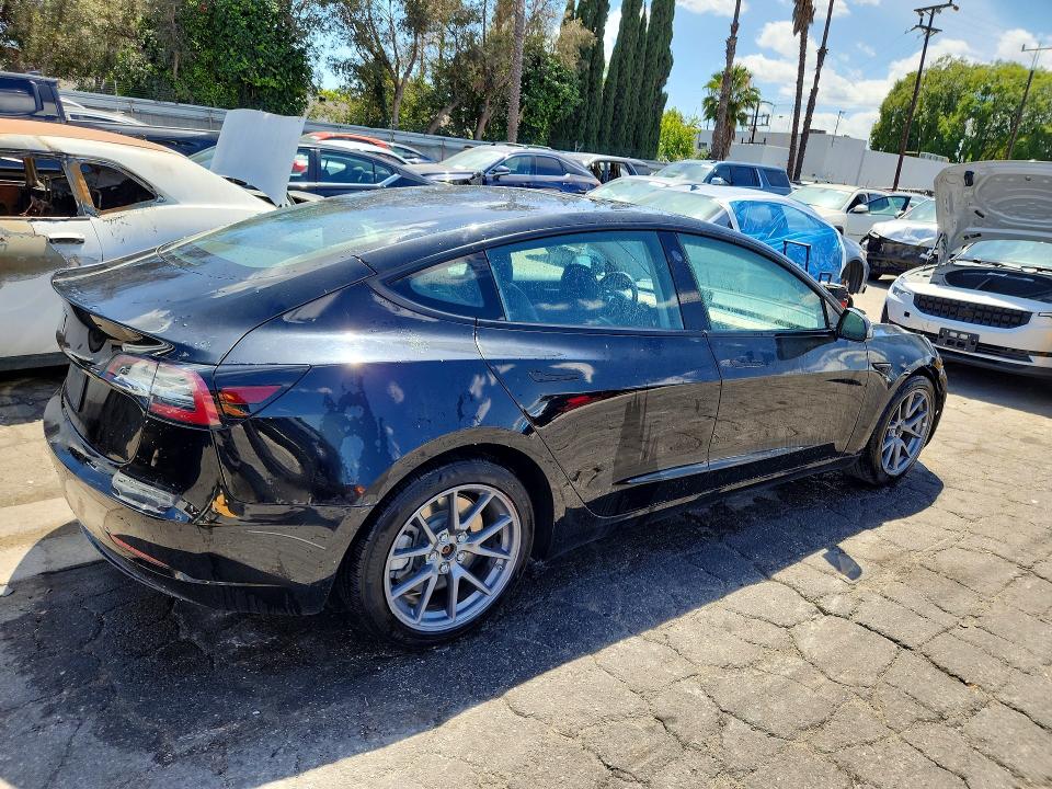 50973286 :رقم المزاد ، 5YJ3E1EA2NF285766 vin ، 2022 Tesla Model 3 مزاد بيع