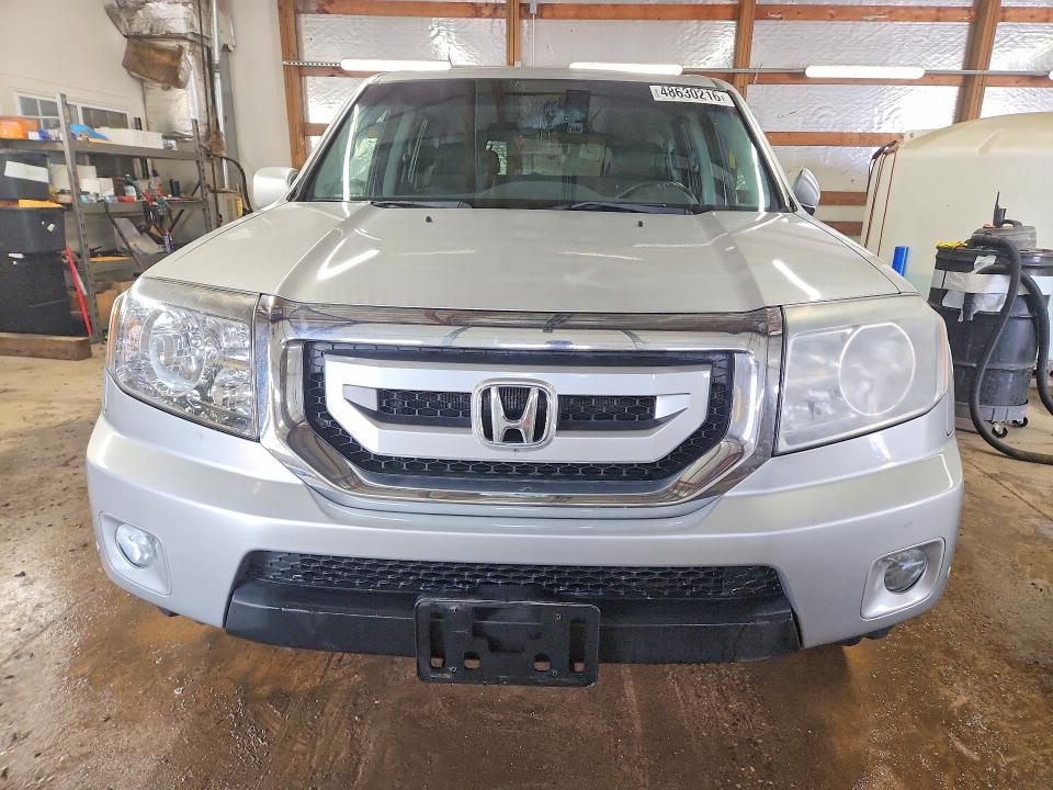 48630216 :رقم المزاد ، 5FNYF4H97BB044948 vin ، 2011 Honda Pilot مزاد بيع