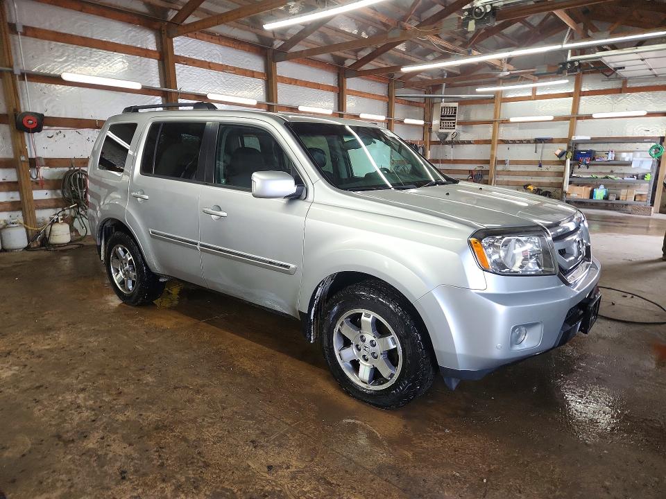48630216 :رقم المزاد ، 5FNYF4H97BB044948 vin ، 2011 Honda Pilot مزاد بيع