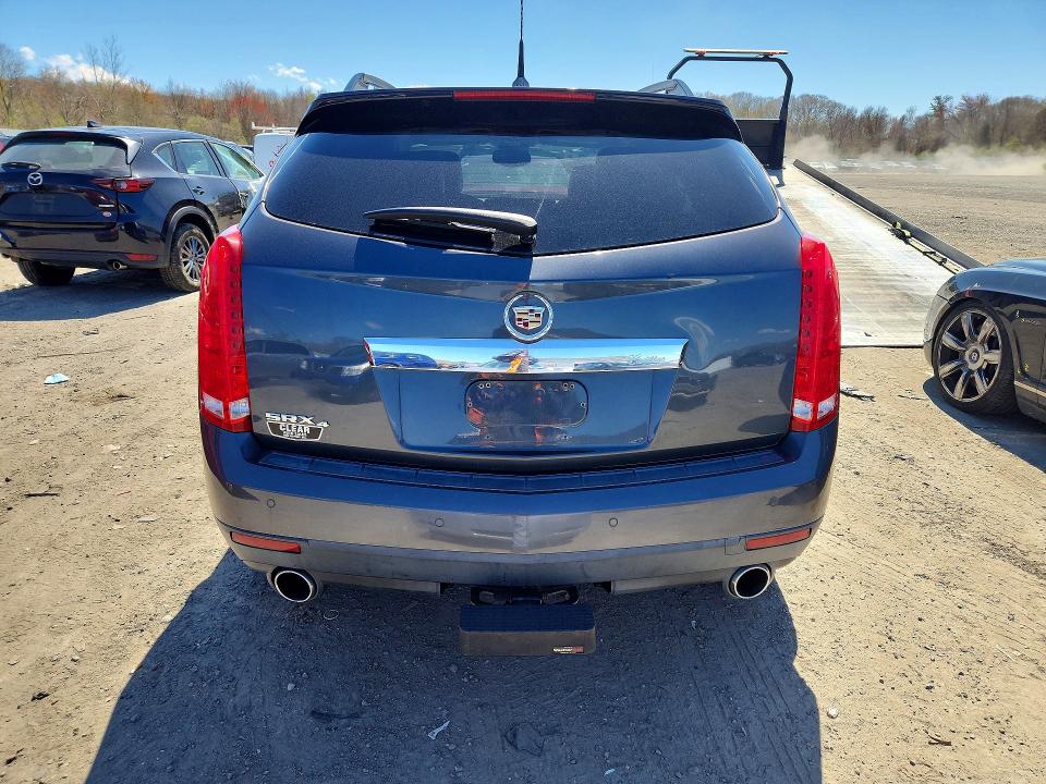 51077866 :رقم المزاد ، 3GYFNDEY0AS570389 vin ، 2010 Cadillac Srx مزاد بيع