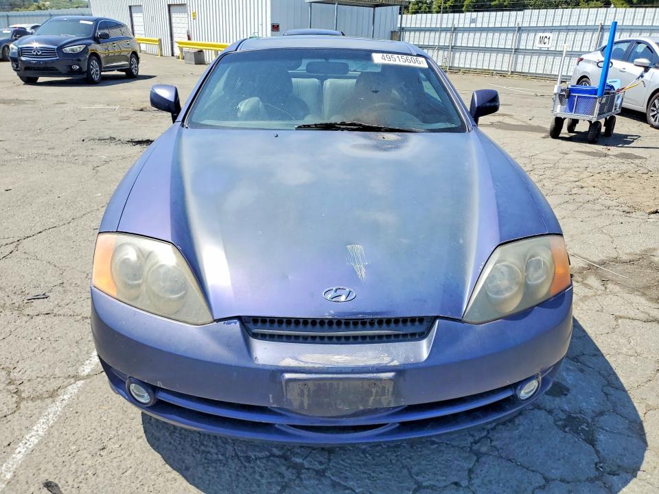 2003 Hyundai Tiburon მანქანა იყიდება აუქციონზე, vin: KMHHN65F03U017880, აუქციონის ნომერი: 49515606