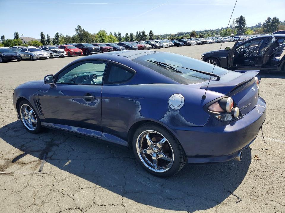 2003 Hyundai Tiburon მანქანა იყიდება აუქციონზე, vin: KMHHN65F03U017880, აუქციონის ნომერი: 49515606