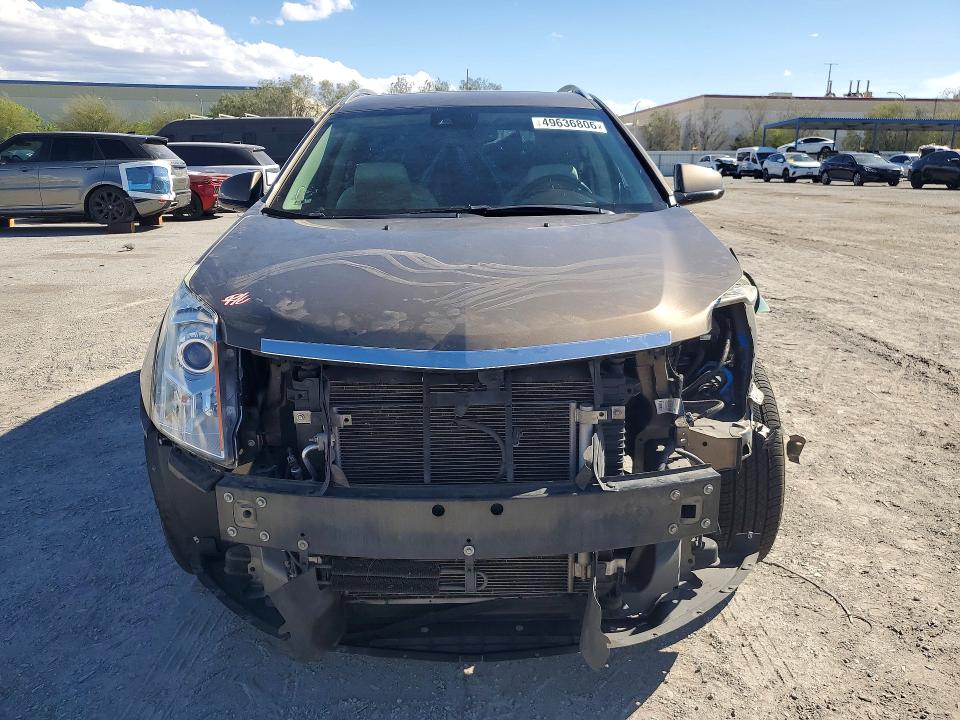2015 Cadillac Srx მანქანა იყიდება აუქციონზე, vin: 3GYFNBE36FS515865, აუქციონის ნომერი: 49636806