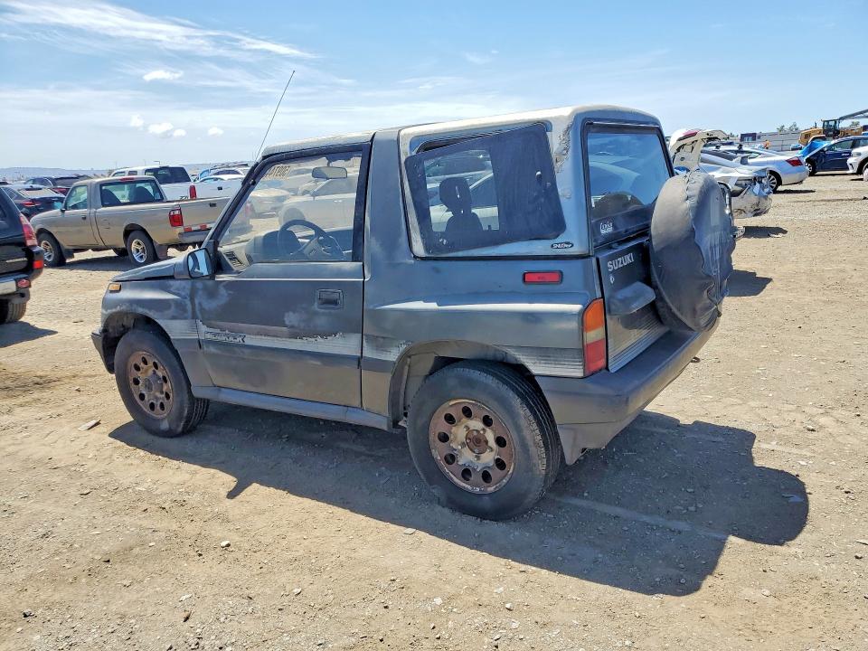 50974486 :رقم المزاد ، JS3TA01C5K4112583 vin ، 1989 Suzuki Sidekick مزاد بيع