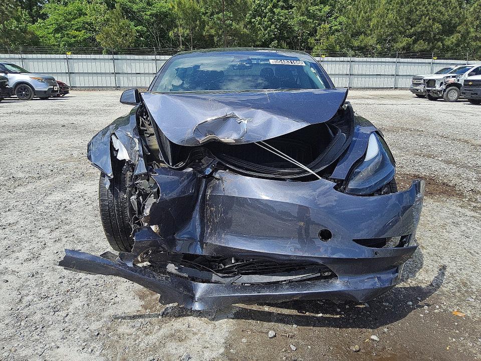 Продажа на аукционе авто 2021 Tesla Model 3, vin: 5YJ3E1EBXMF974428, номер лота: 50483166