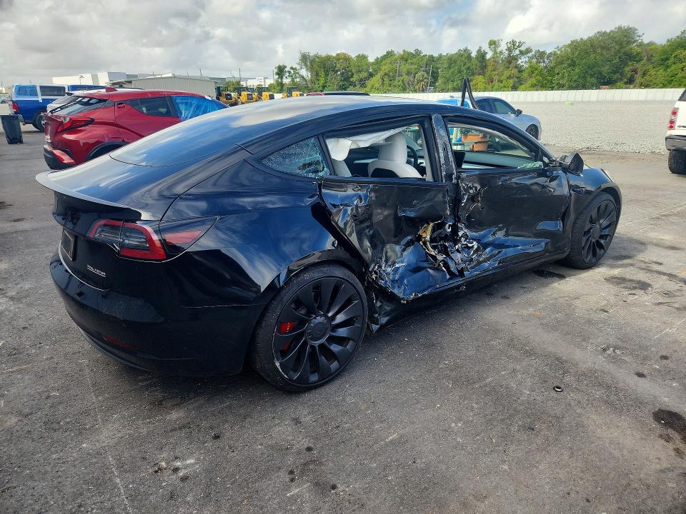 Продажа на аукционе авто 2023 Tesla Model 3, vin: 5YJ3E1EC2PF582671, номер лота: 48705706