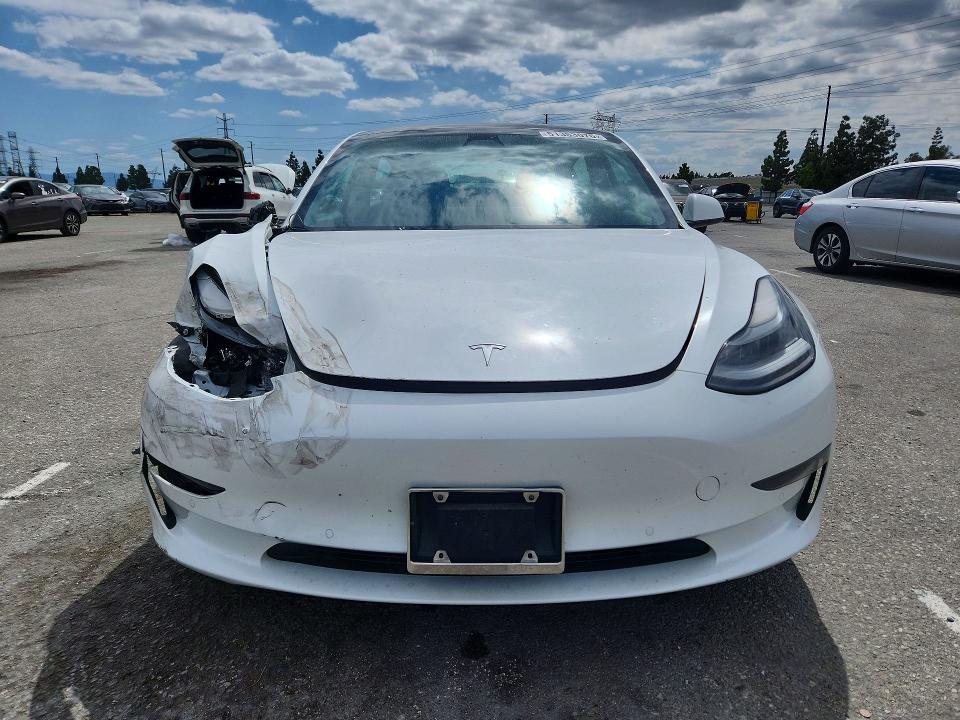 Продаж на аукціоні авто 2021 Tesla Model 3, vin: 5YJ3E1EAXMF052099, номер лоту: 51353076