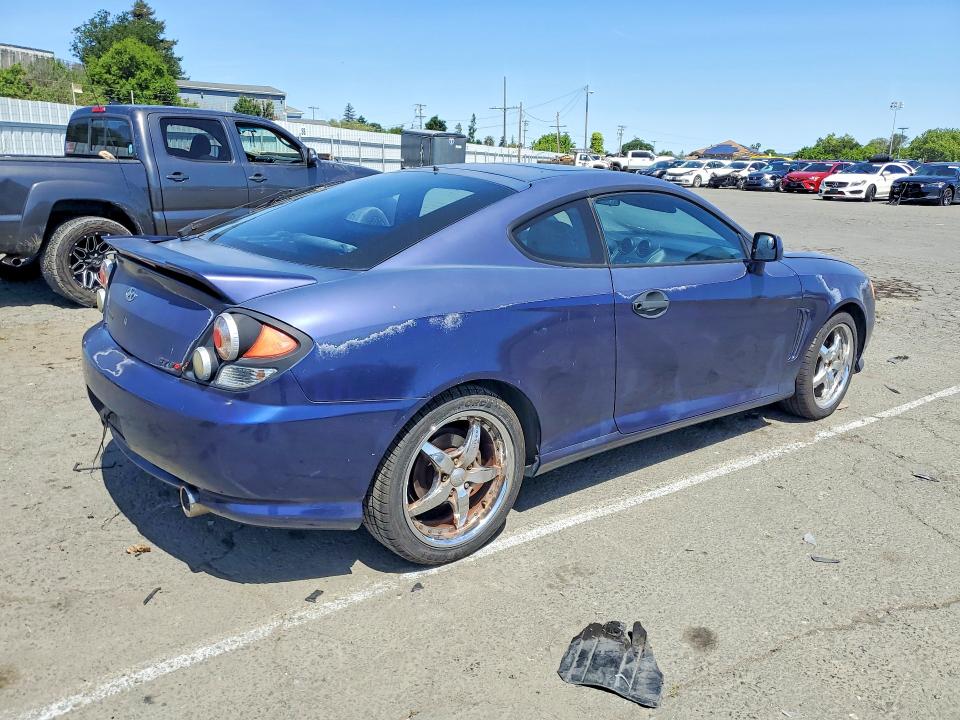 2003 Hyundai Tiburon მანქანა იყიდება აუქციონზე, vin: KMHHN65F03U017880, აუქციონის ნომერი: 49515606