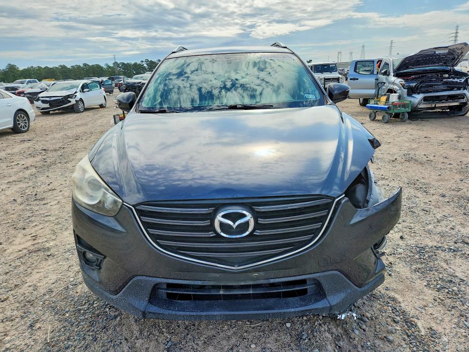 2016 Mazda Cx-5 მანქანა იყიდება აუქციონზე, vin: JM3KE2CY2G0811677, აუქციონის ნომერი: 50450386