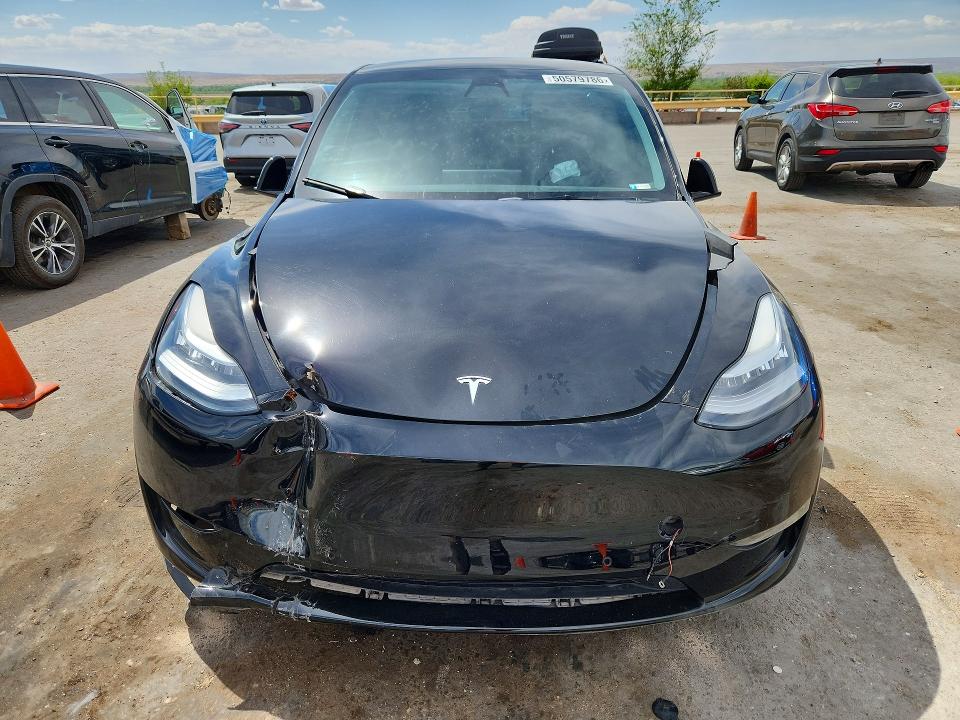 2021 Tesla Model Y მანქანა იყიდება აუქციონზე, vin: 5YJYGAEE4MF113143, აუქციონის ნომერი: 50579786