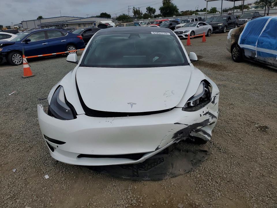 Продажа на аукционе авто 2021 Tesla Model 3, vin: 5YJ3E1EAXMF067685, номер лота: 51857776