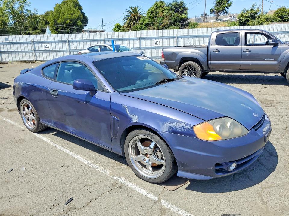 2003 Hyundai Tiburon მანქანა იყიდება აუქციონზე, vin: KMHHN65F03U017880, აუქციონის ნომერი: 49515606