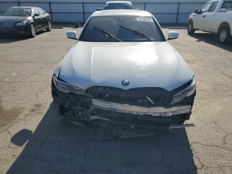 50158596 :رقم المزاد ، 3MW5R1J06M8B63566 vin ، 2021 Bmw 330i مزاد بيع