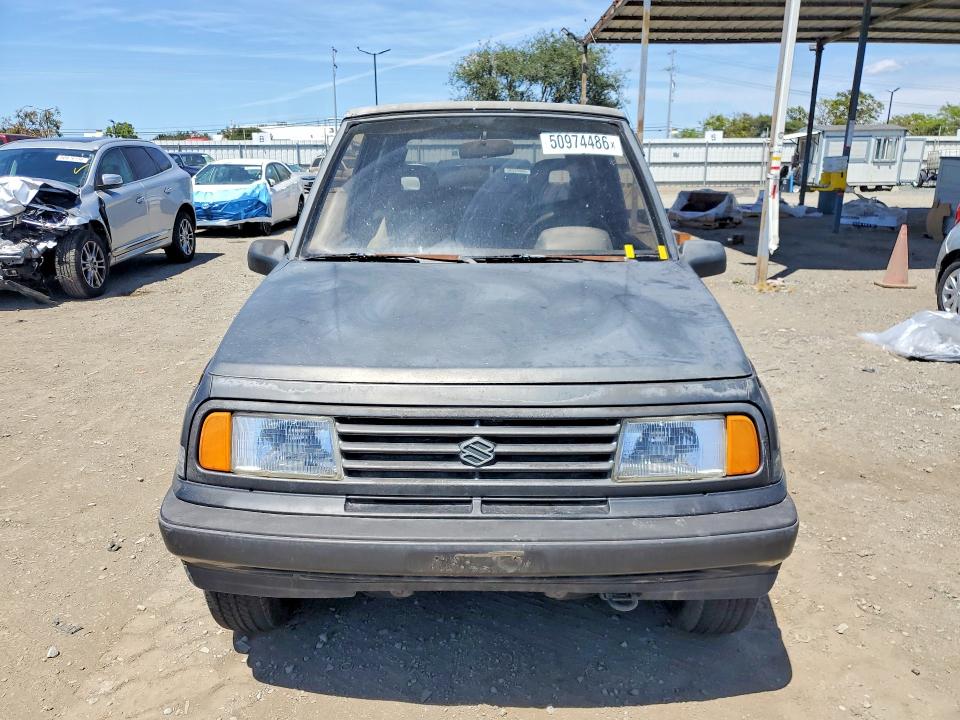 50974486 :رقم المزاد ، JS3TA01C5K4112583 vin ، 1989 Suzuki Sidekick مزاد بيع