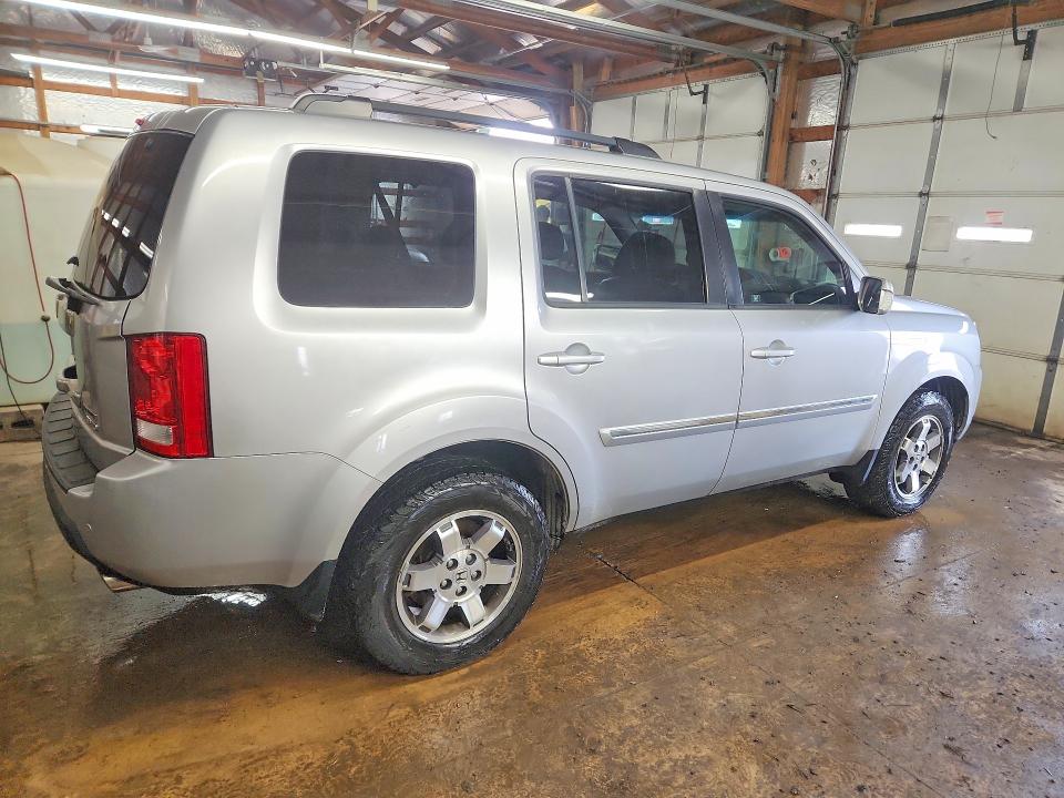 48630216 :رقم المزاد ، 5FNYF4H97BB044948 vin ، 2011 Honda Pilot مزاد بيع