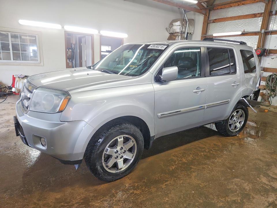 48630216 :رقم المزاد ، 5FNYF4H97BB044948 vin ، 2011 Honda Pilot مزاد بيع