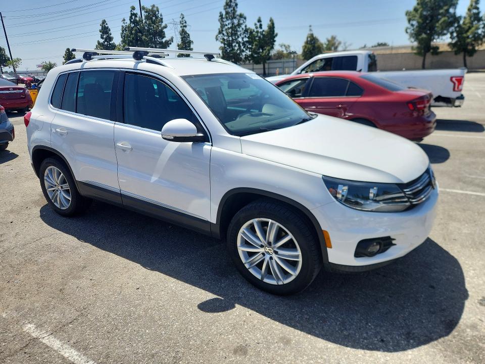 Продажа на аукционе авто 2014 Volkswagen Tiguan, vin: WVGAV3AX4EW550496, номер лота: 49976316