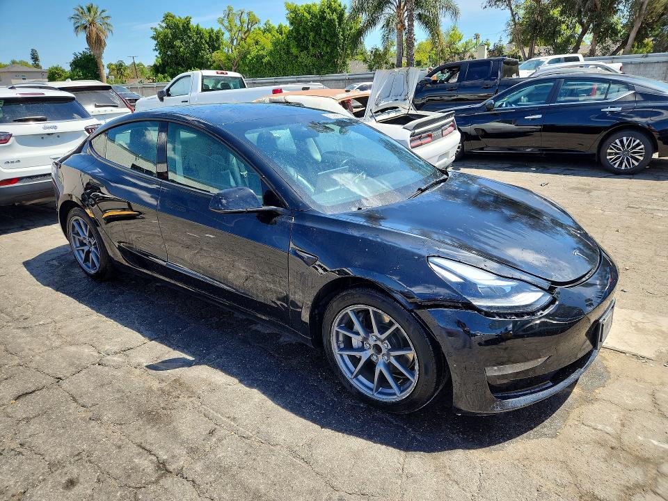 50973286 :رقم المزاد ، 5YJ3E1EA2NF285766 vin ، 2022 Tesla Model 3 مزاد بيع