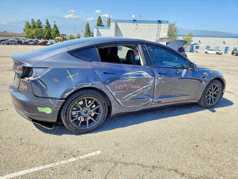 Продажа на аукционе авто 2023 Tesla Model 3, vin: 5YJ3E1EAXPF518716, номер лота: 49119236
