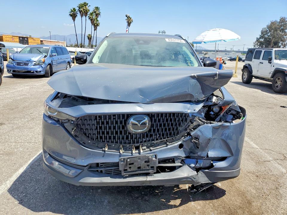 Продаж на аукціоні авто 2021 Mazda Cx-5, vin: JM3KFACY1M0403884, номер лоту: 49931756
