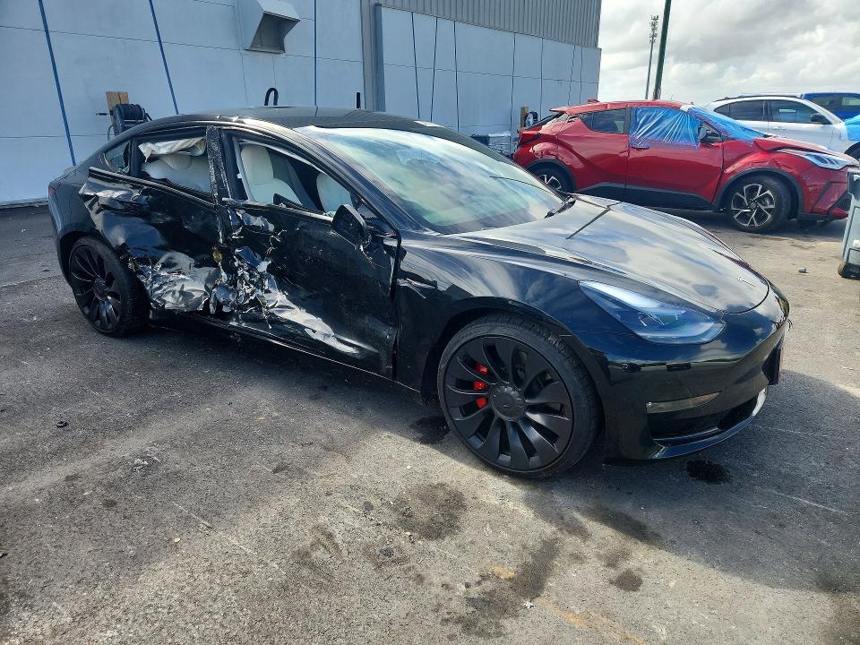 Продажа на аукционе авто 2023 Tesla Model 3, vin: 5YJ3E1EC2PF582671, номер лота: 48705706