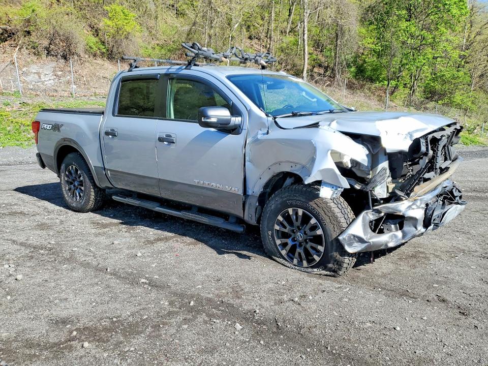 51220976 :رقم المزاد ، 1N6AA1E52KN504371 vin ، 2019 Nissan Titan مزاد بيع