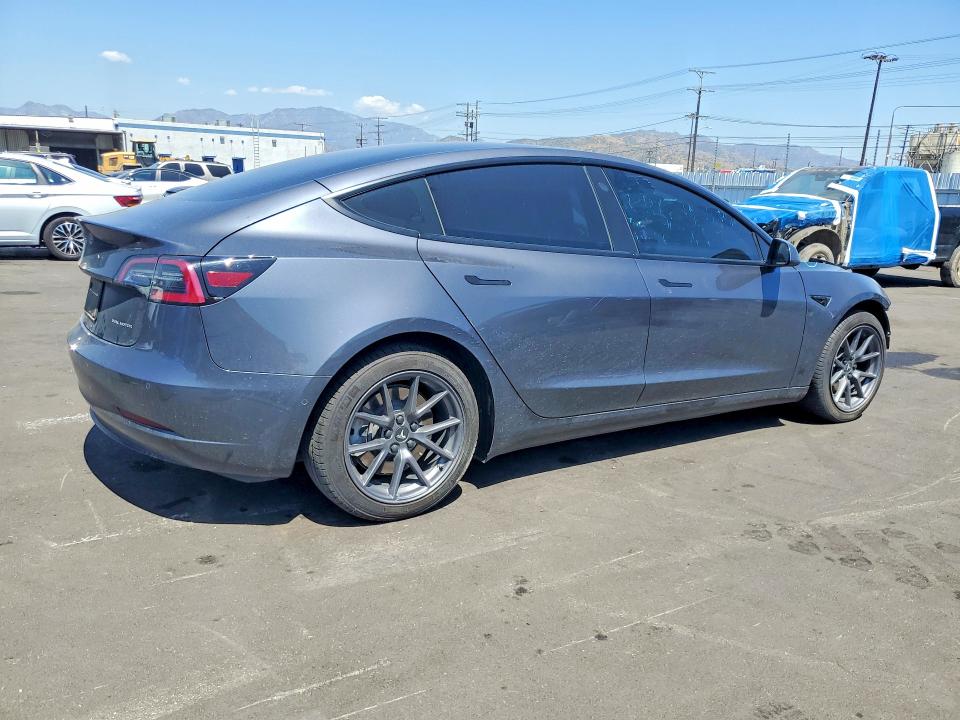 Продажа на аукционе авто 2022 Tesla Model 3, vin: 5YJ3E1EB2NF207710, номер лота: 52823256