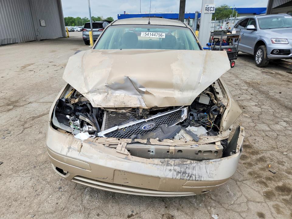 54144756 :رقم المزاد ، 1FAHP34N37W135038 vin ، 2007 Ford Focus مزاد بيع