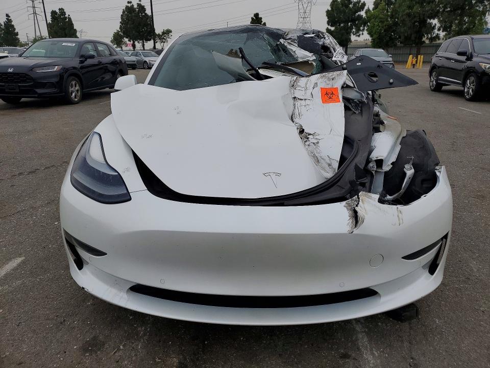 Продажа на аукционе авто 2022 Tesla Model 3, vin: 5YJ3E1EAXNF302703, номер лота: 53306046