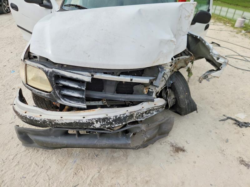 54637076 :رقم المزاد ، 1FTZF1728XNA63735 vin ، 1999 Ford F150 مزاد بيع