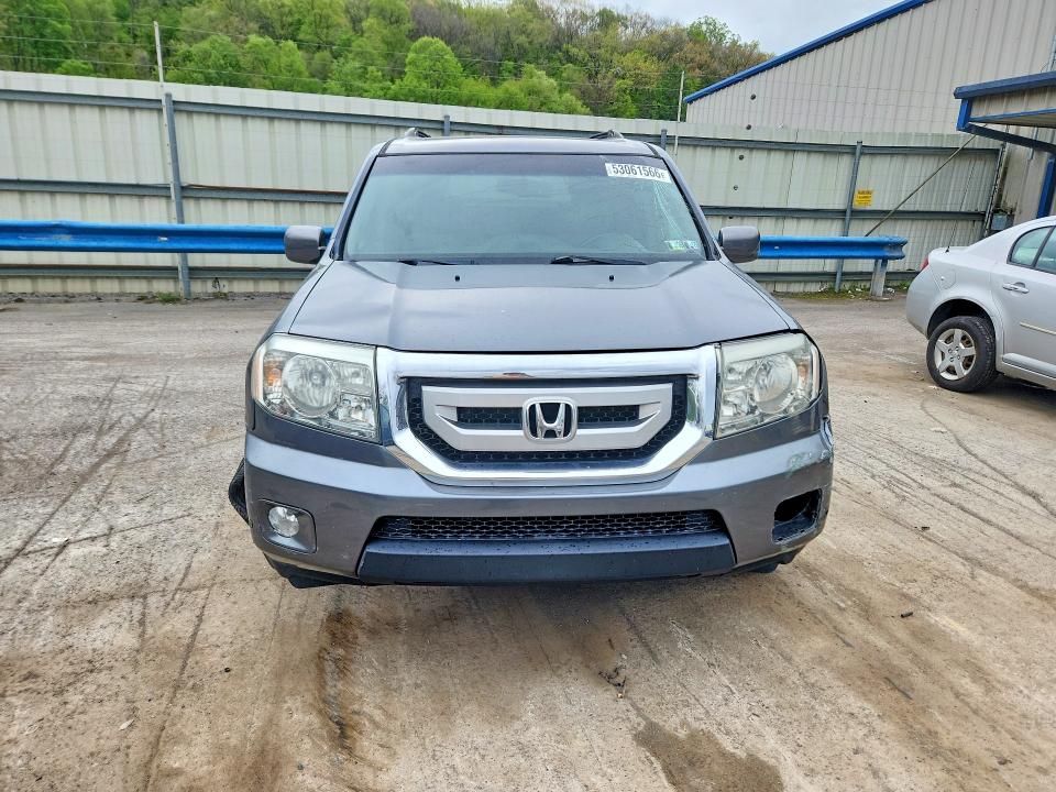 53061566 :رقم المزاد ، 5FNYF4H91BB101838 vin ، 2011 Honda Pilot مزاد بيع