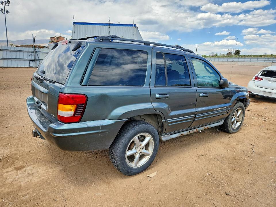 2002 Jeep Grand Cherokee მანქანა იყიდება აუქციონზე, vin: 1J8GW68J12C206709, აუქციონის ნომერი: 53650366