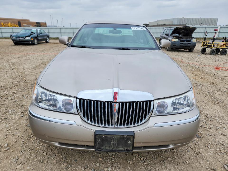 52152086 :رقم المزاد ، 1LNHM82WXXY617095 vin ، 1999 Lincoln Town Car مزاد بيع
