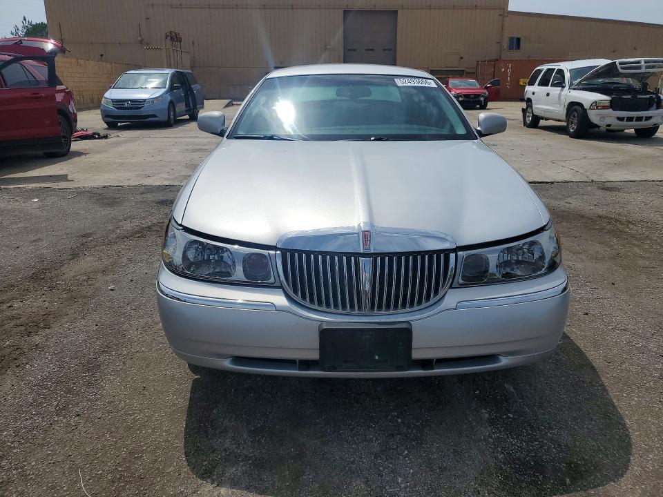 Auction sale of the 1999 Lincoln Town Car, vin: 1LNHM82W2XY677470, lot number: 52493666