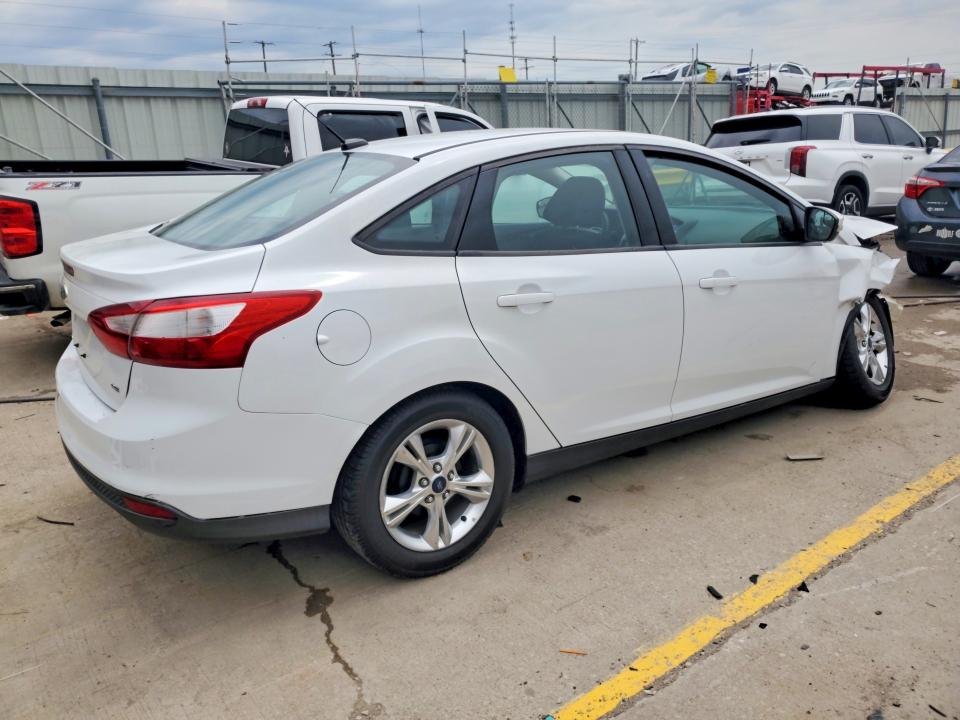 Auction sale of the 2014 Ford Focus, vin: 1FADP3F25EL265404, lot number: 52263006