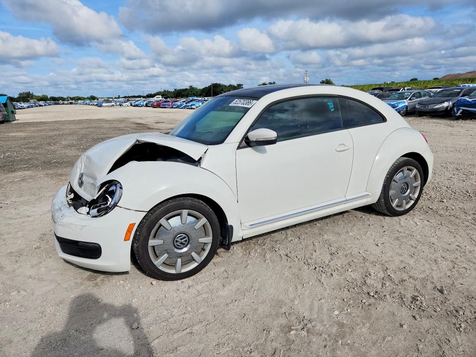 52570386 :رقم المزاد ، 3VWJP7AT1DM666432 vin ، 2013 Volkswagen Beetle مزاد بيع