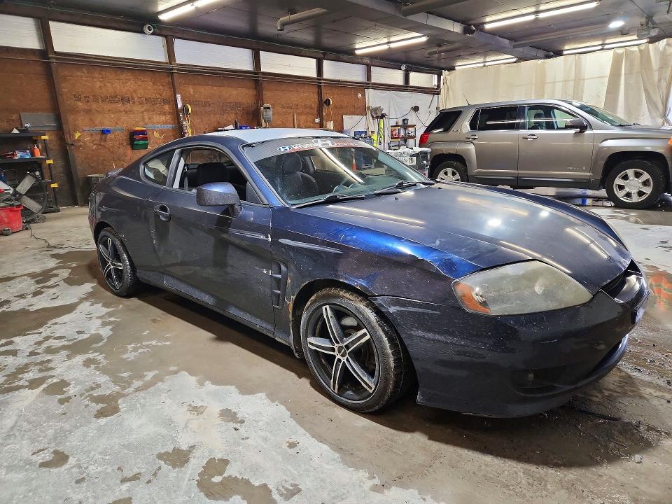 2006 Hyundai Tiburon მანქანა იყიდება აუქციონზე, vin: KMHHM65D56U211892, აუქციონის ნომერი: 51901146
