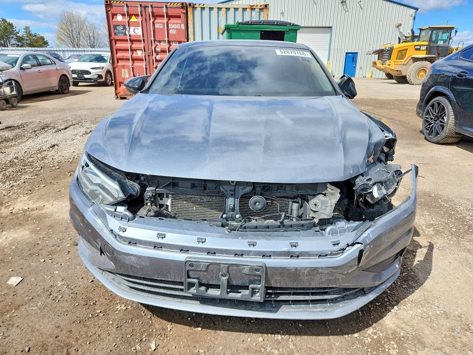 52870766 :رقم المزاد ، 3VWE57BU6MM077164 vin ، 2021 Volkswagen Jetta مزاد بيع