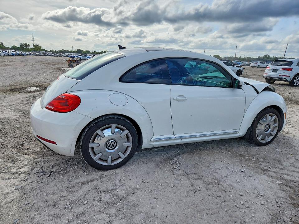 52570386 :رقم المزاد ، 3VWJP7AT1DM666432 vin ، 2013 Volkswagen Beetle مزاد بيع