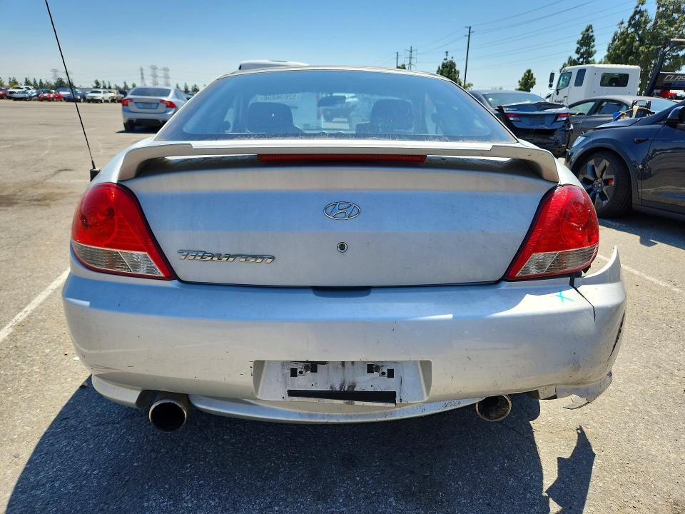 52696856 :رقم المزاد ، KMHHM65D96U227335 vin ، 2006 Hyundai Tiburon مزاد بيع