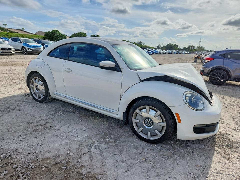 52570386 :رقم المزاد ، 3VWJP7AT1DM666432 vin ، 2013 Volkswagen Beetle مزاد بيع