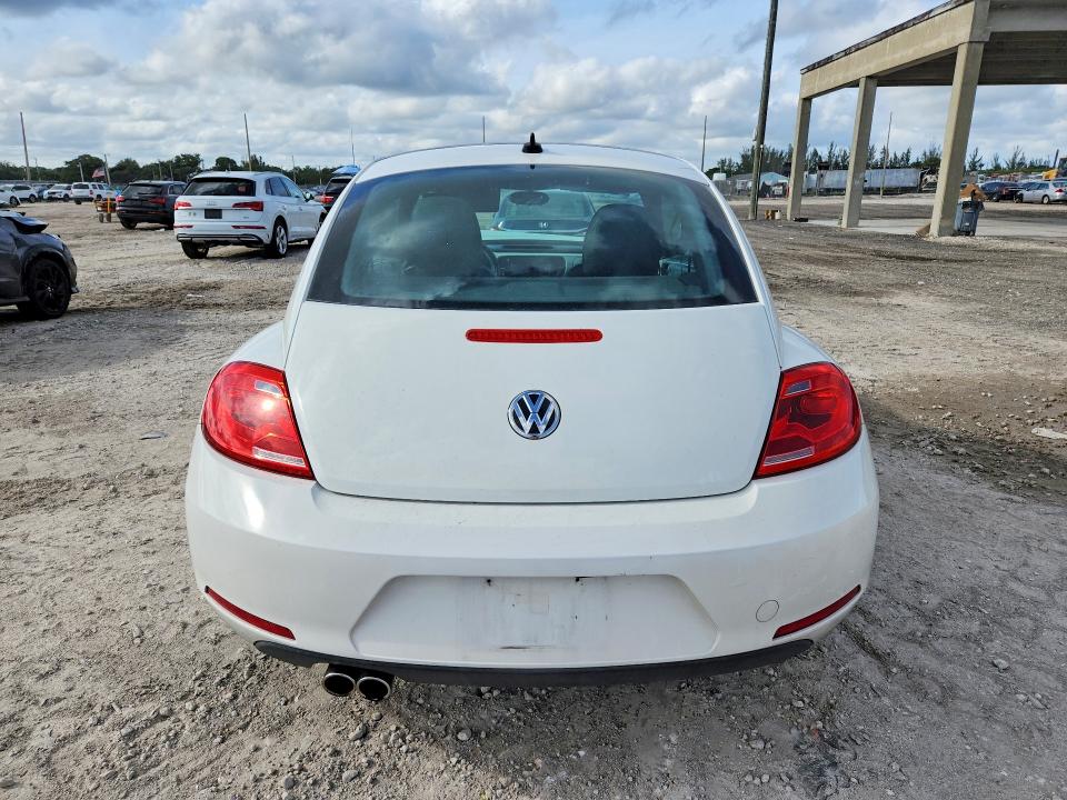 52570386 :رقم المزاد ، 3VWJP7AT1DM666432 vin ، 2013 Volkswagen Beetle مزاد بيع