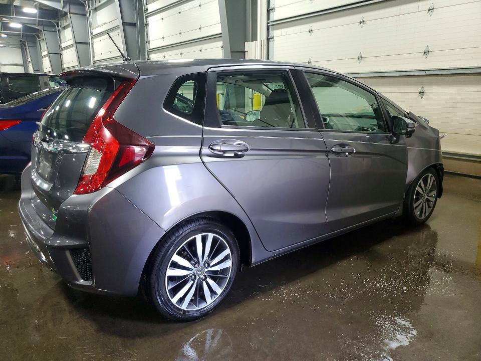55606176 :رقم المزاد ، 3HGGK5H85FM712995 vin ، 2015 Honda Fit مزاد بيع