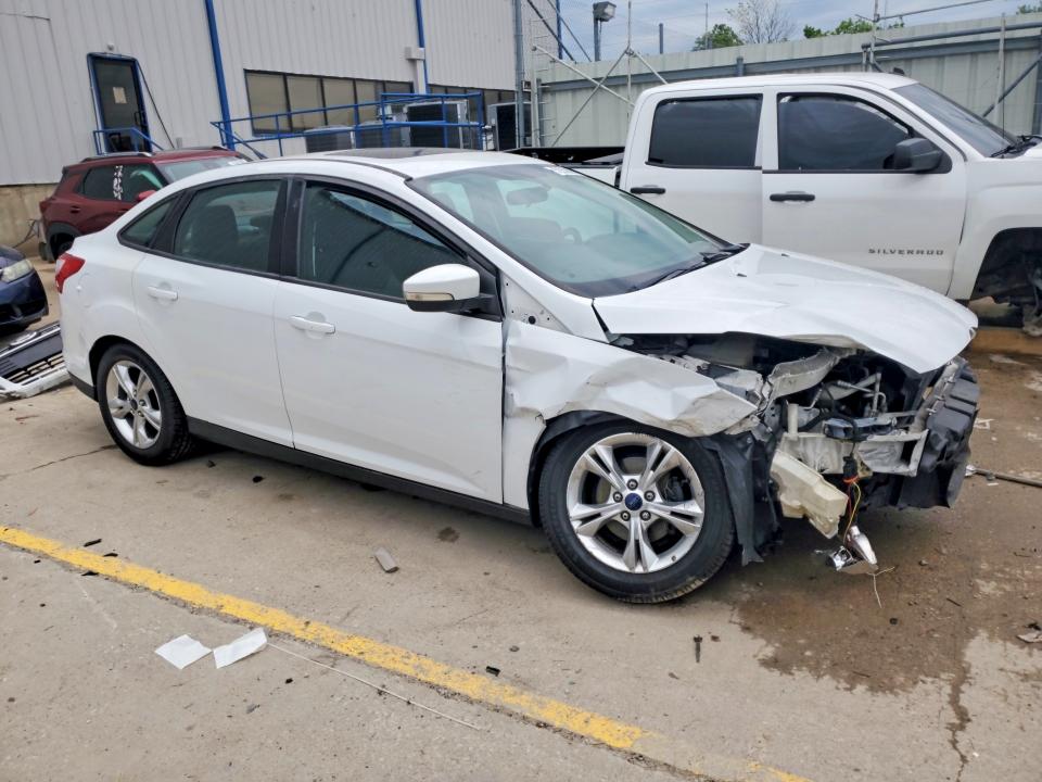 Auction sale of the 2014 Ford Focus, vin: 1FADP3F25EL265404, lot number: 52263006